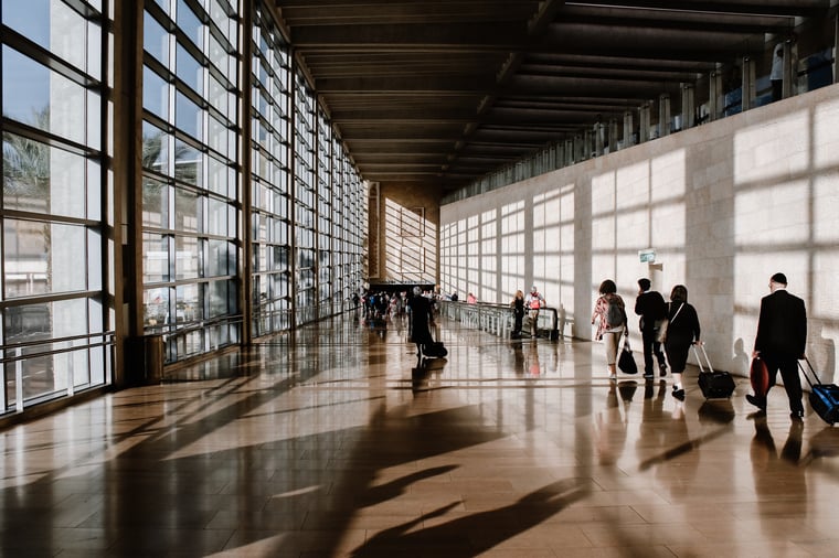 Business travelers walking in an airport