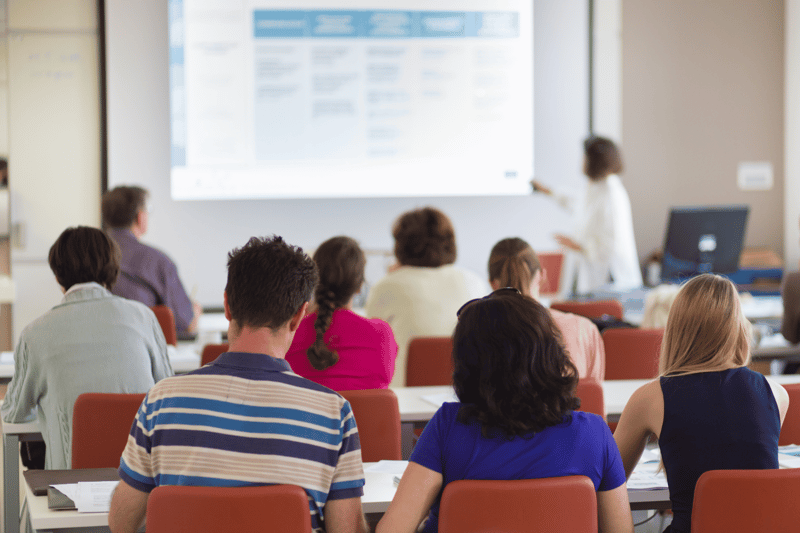 Group of students listening to a lecture