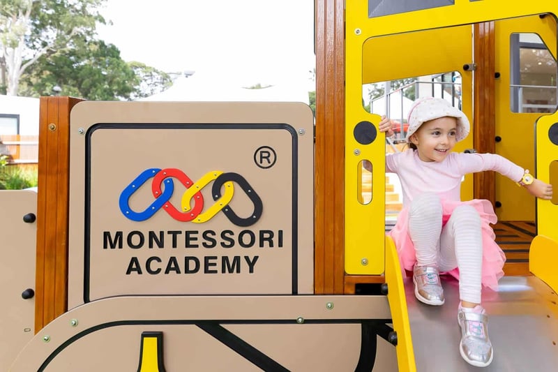 child learning and playing at montessori academy